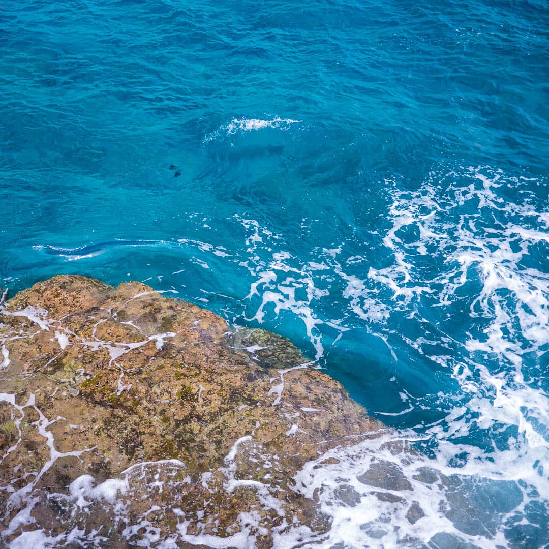 Clear blue water and beautiful rocks underneath