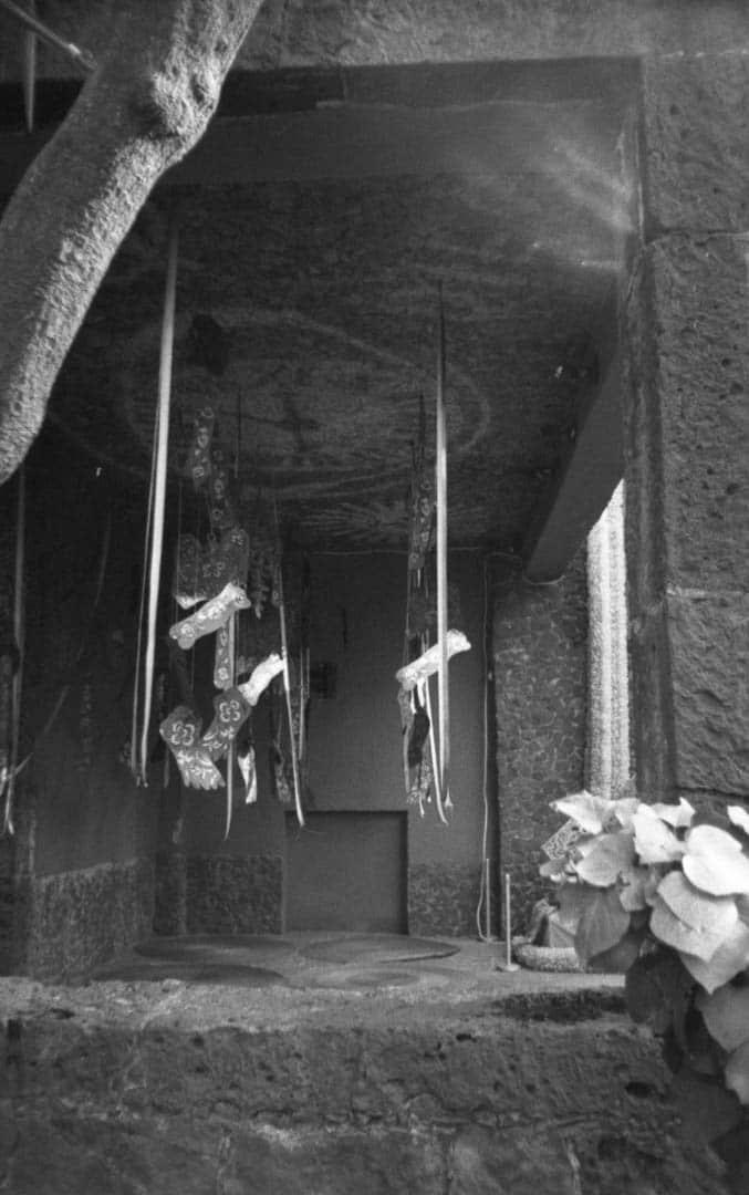 Streamers hanging down from a shrine at Frida Kahlo’s home