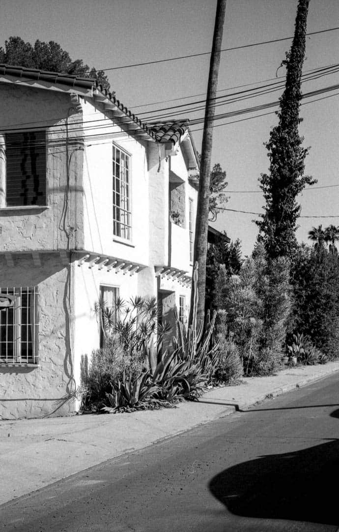 Sun against a stucco house